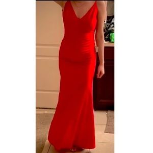 Long red formal dress with open back